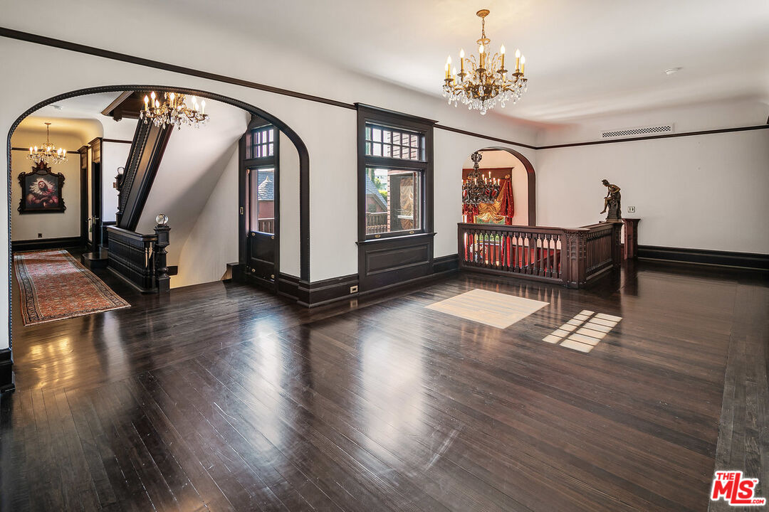 357 Lorraine Boulevard Los Angeles, CA 90020 - Photo 14 of 34 a living room with furniture and a large window