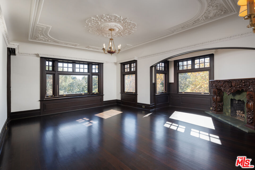 357 Lorraine Boulevard Los Angeles, CA 90020 - Photo 17 of 34 a view of gallery with wooden floor