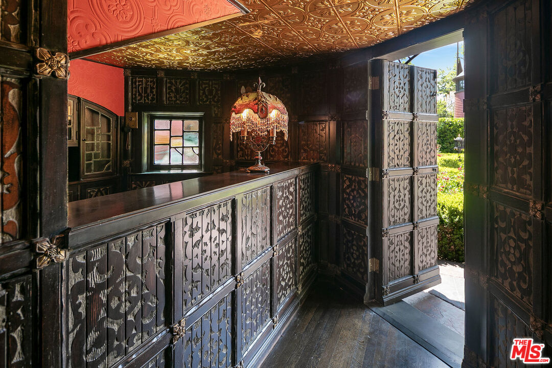 357 Lorraine Boulevard Los Angeles, CA 90020 - Photo 28 of 34 a view of a porch with wooden floor and stairs