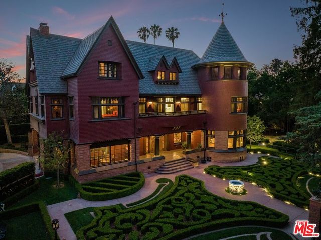 a view of park with large trees