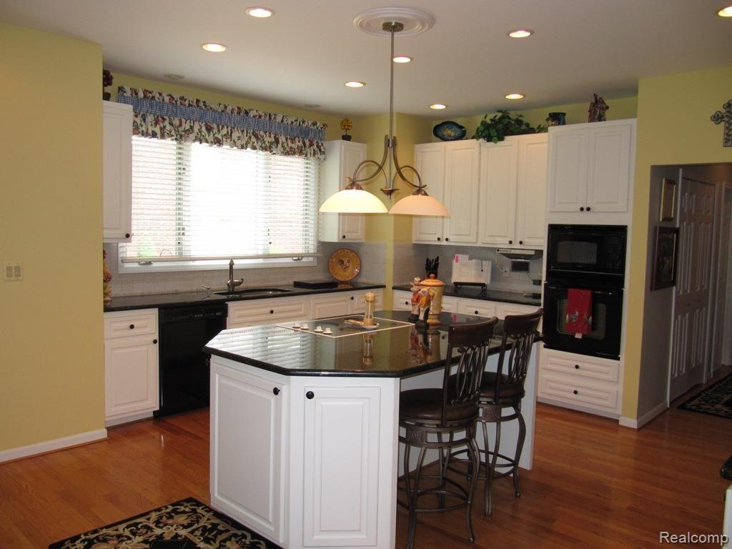 1408 Pebble Ridge Drive Rochester, MI 48307 - Photo 12 of 69 Granite island.jpg