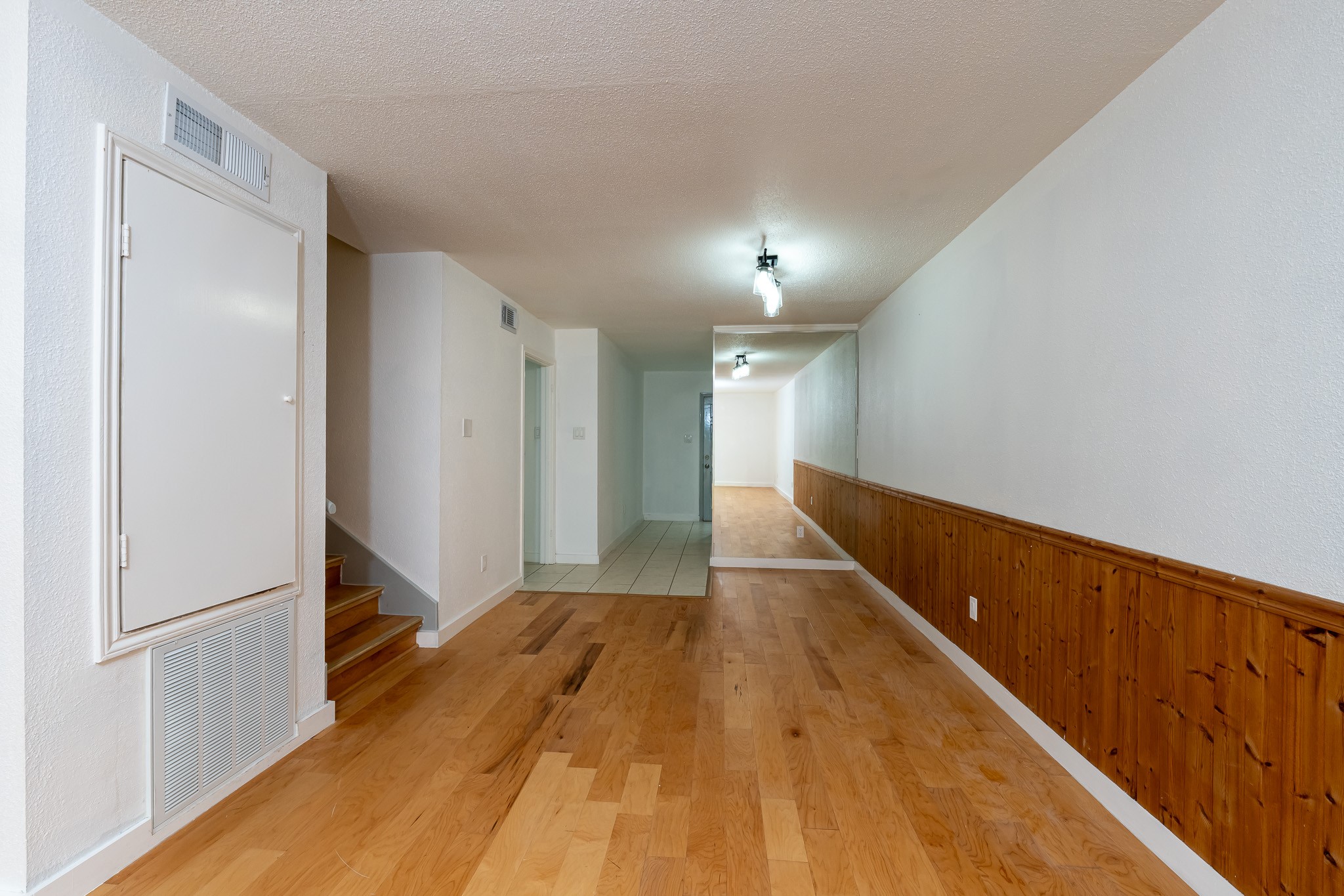 8486 Ariel Street Houston, TX 77074 - Photo 26 of 45 a view of hallway with stairs