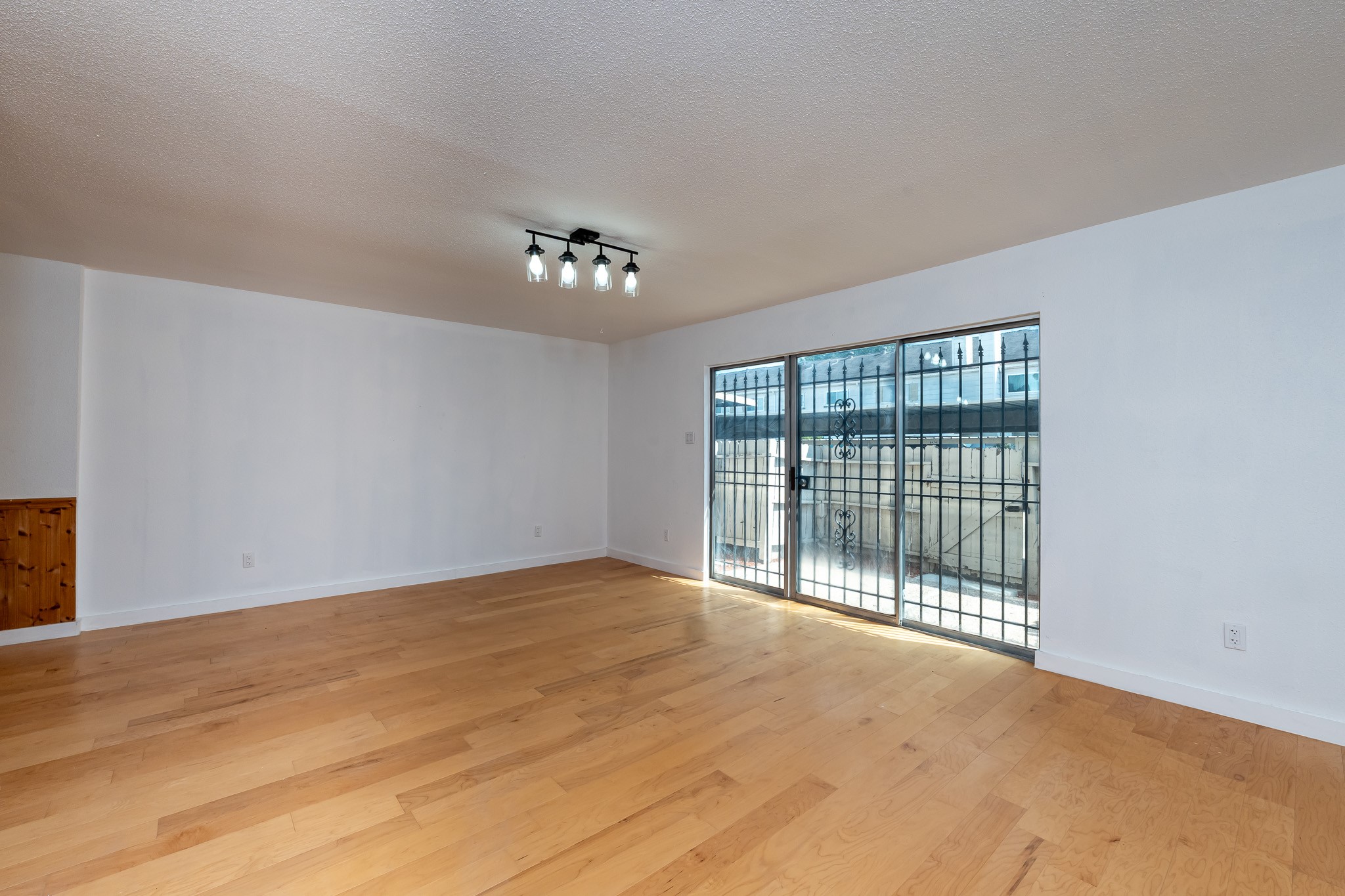 8486 Ariel Street Houston, TX 77074 - Photo 27 of 45 a view of an empty room with a window