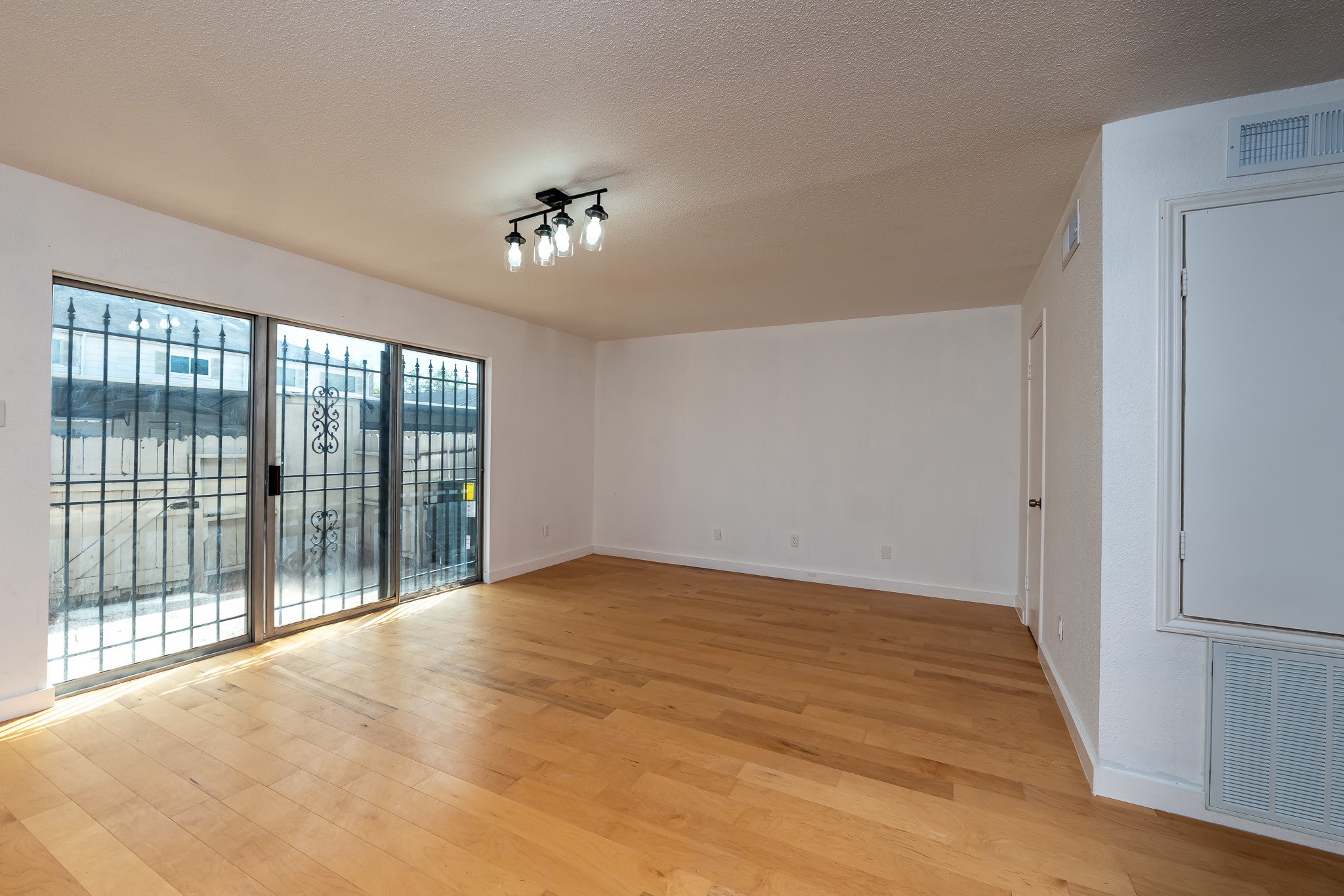 8486 Ariel Street Houston, TX 77074 - Photo 29 of 45 a view of an empty room with a window