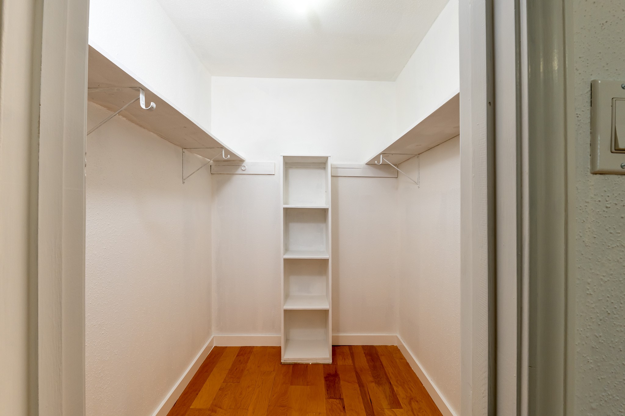 8486 Ariel Street Houston, TX 77074 - Photo 31 of 45 a view of walk in closet with empty room
