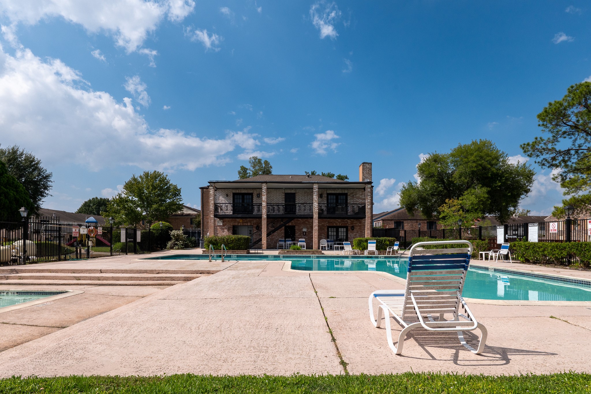 8486 Ariel Street Houston, TX 77074 - Photo 6 of 45 a view of a street with a building in the background