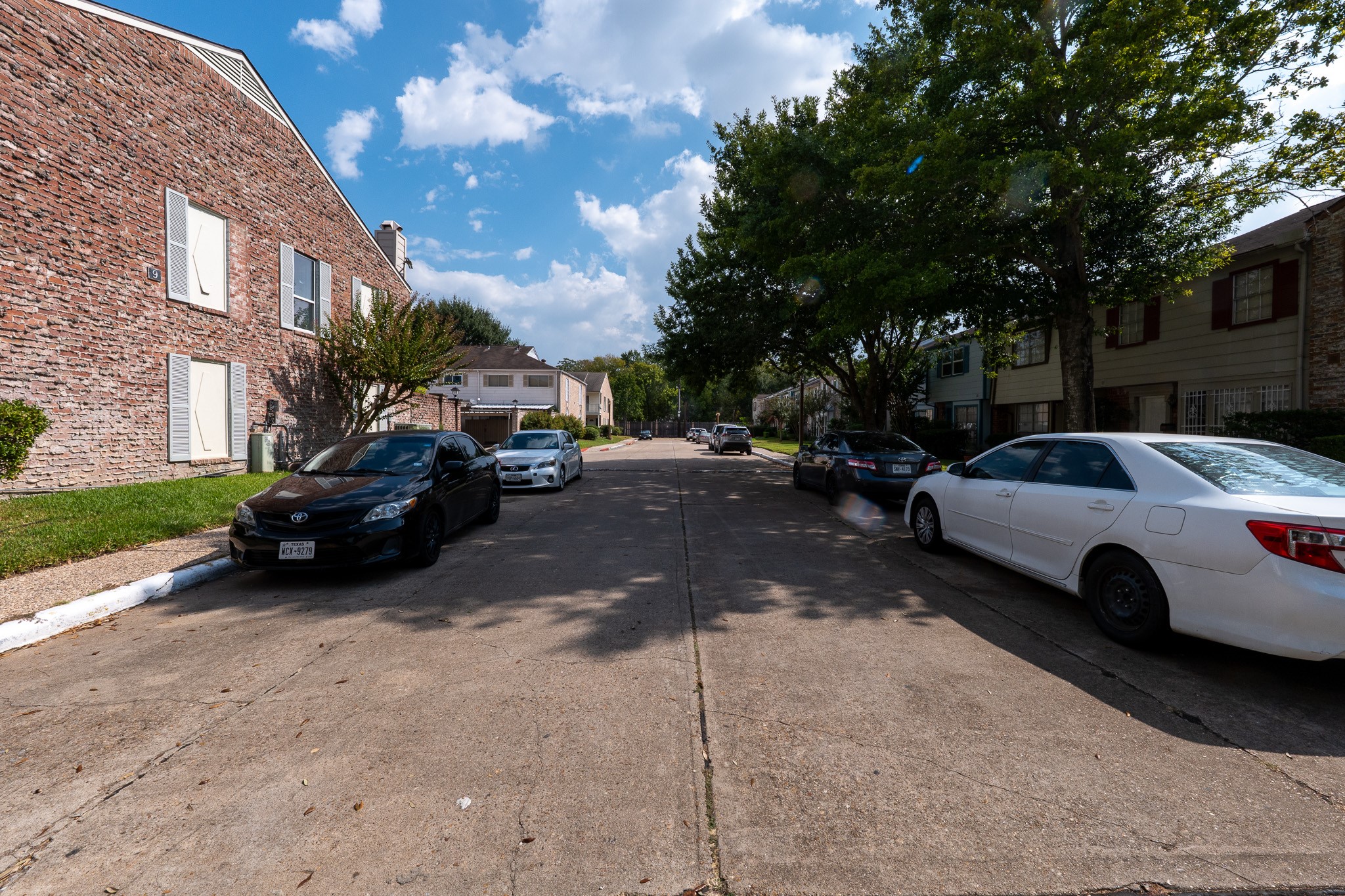 8486 Ariel Street Houston, TX 77074 - Photo 10 of 45 a view of street with parked cars