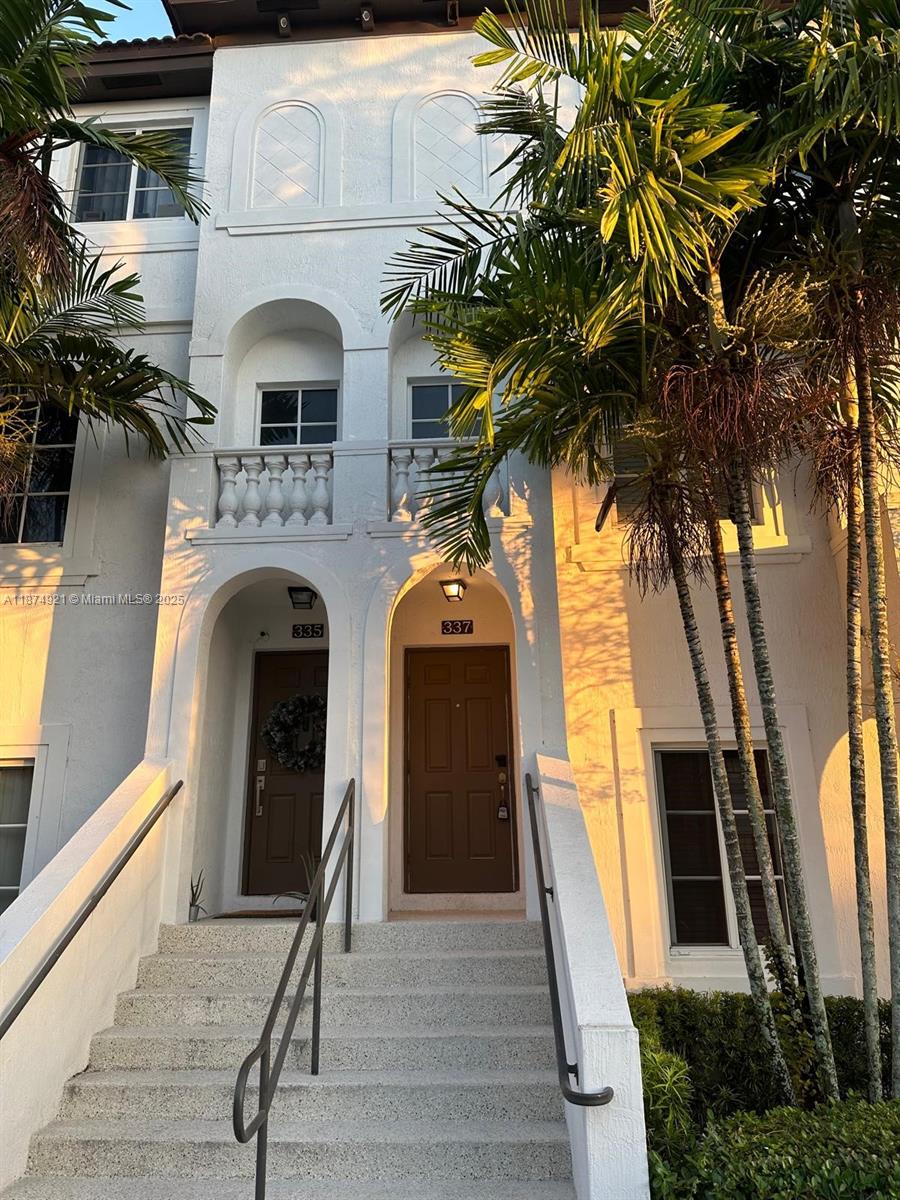 a front view of a house with balcony