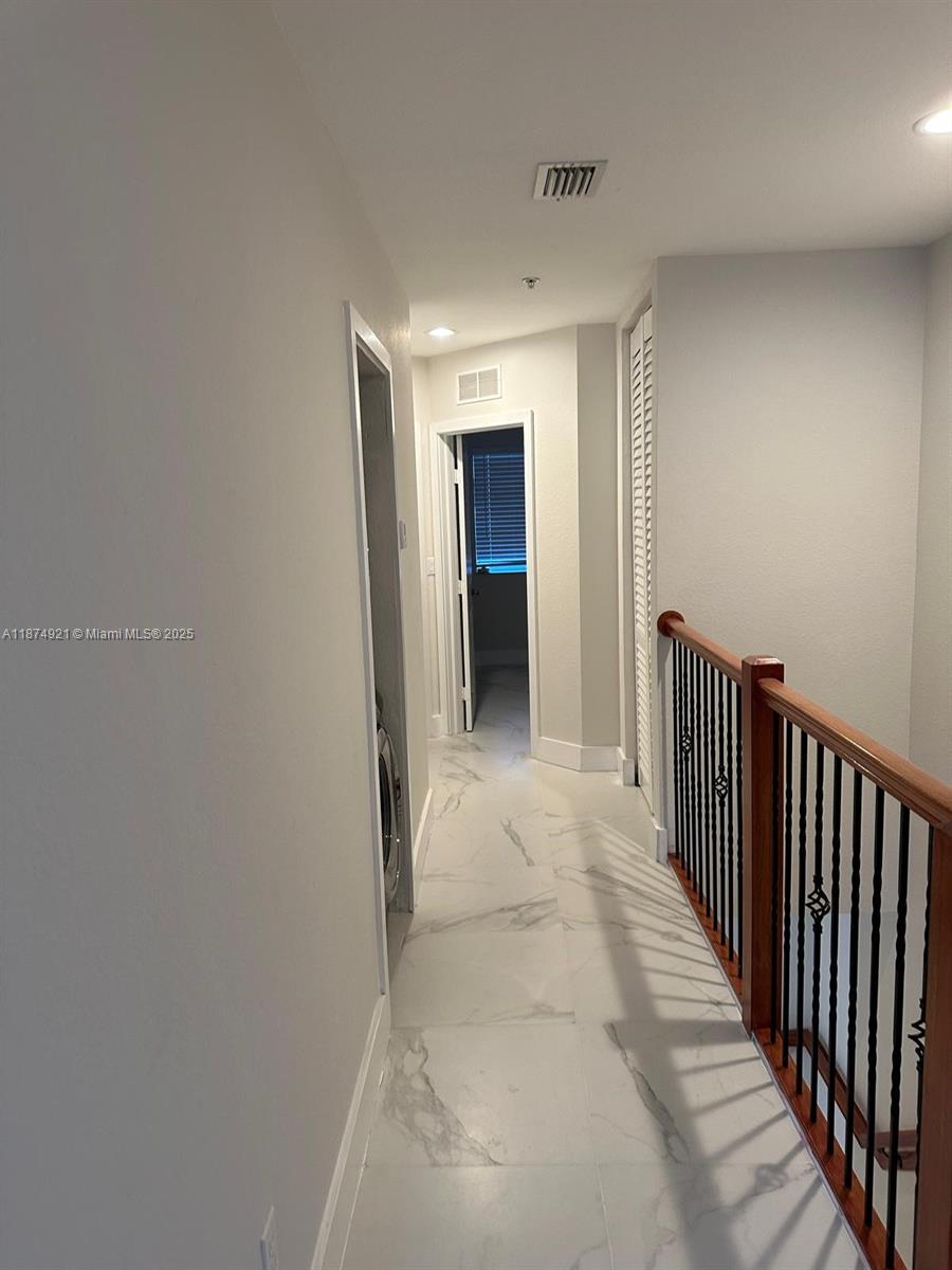 12421 Southwest 50th Court, Unit 337 Miramar, FL 33027 - Photo 12 of 46 a view of hallway with stairs