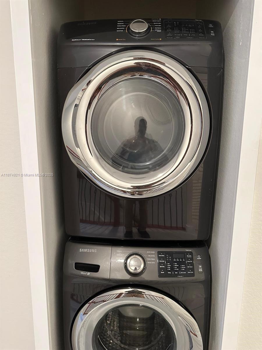 12421 Southwest 50th Court, Unit 337 Miramar, FL 33027 - Photo 13 of 46 a close up view of washer and dryer