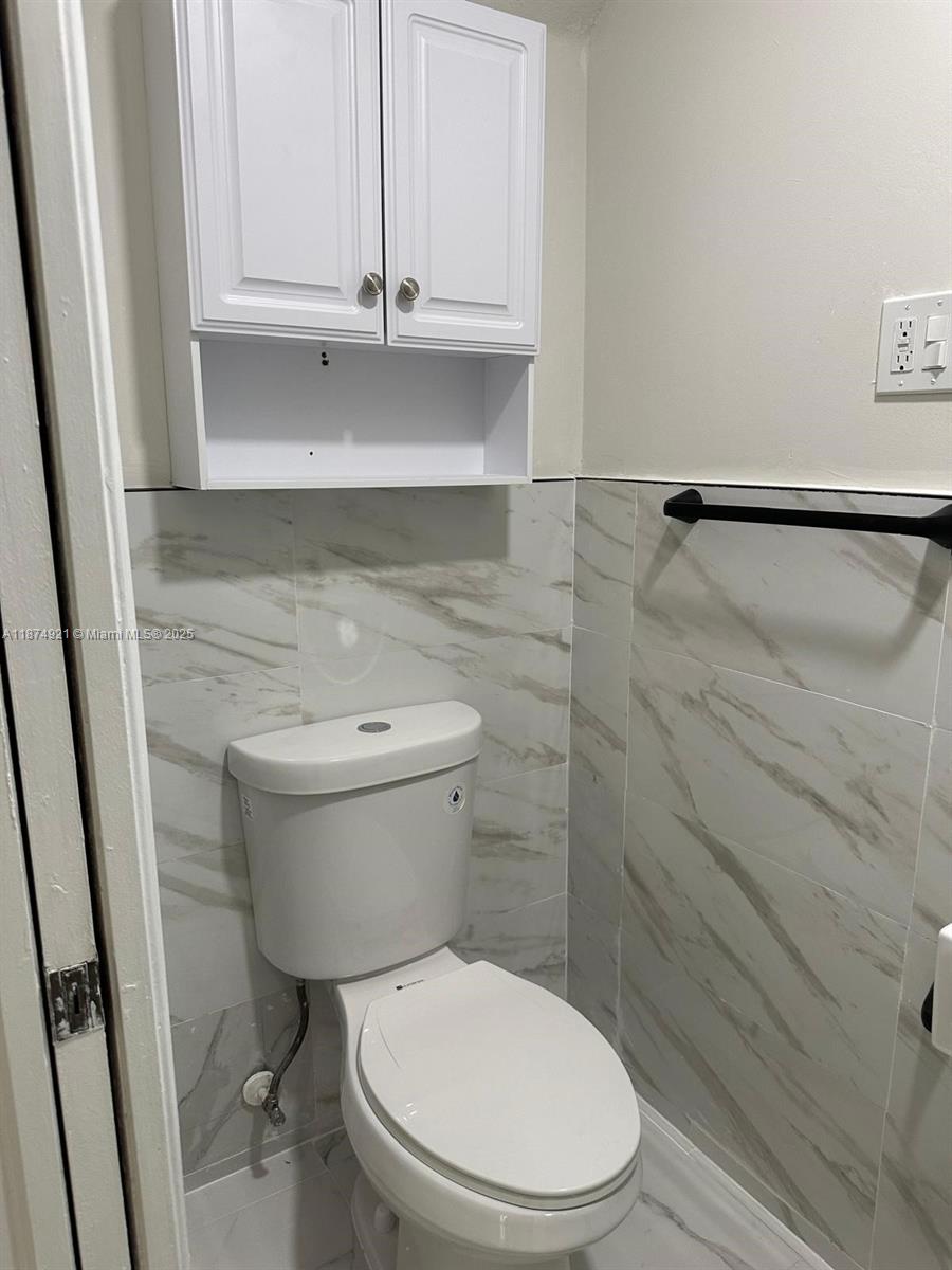 12421 Southwest 50th Court, Unit 337 Miramar, FL 33027 - Photo 45 of 46 a bathroom with a toilet