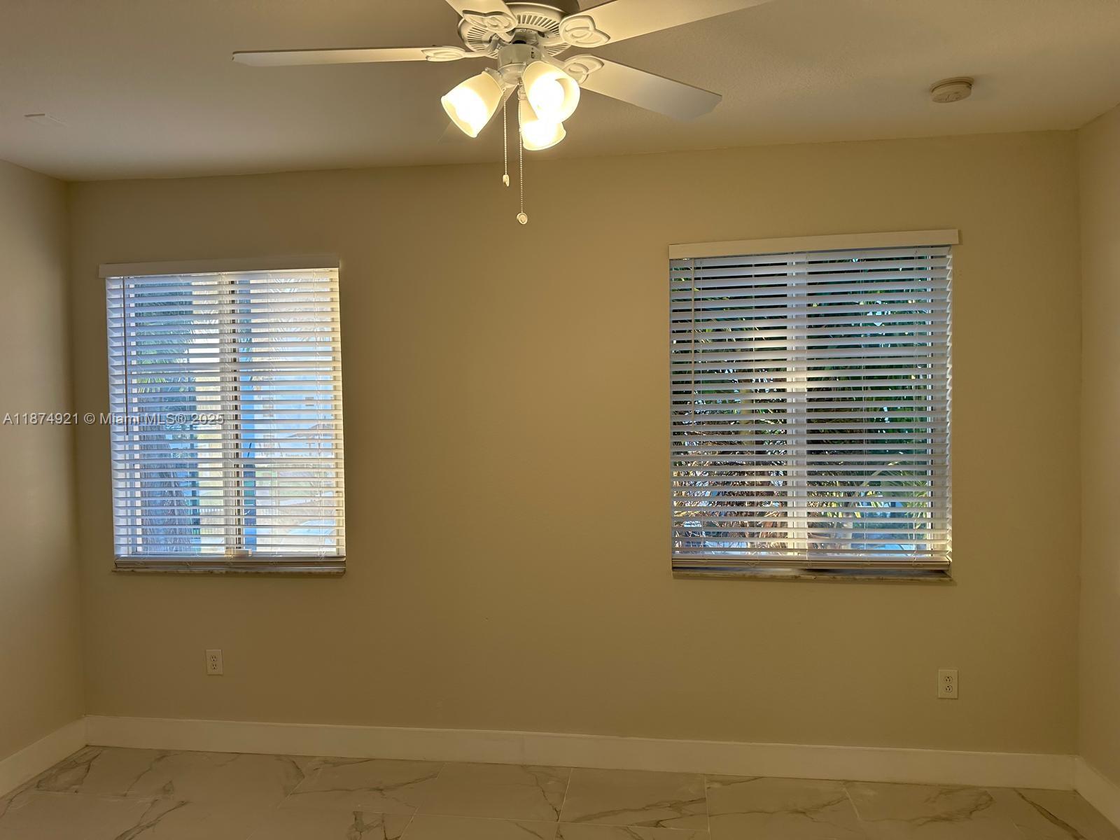 12421 Southwest 50th Court, Unit 337 Miramar, FL 33027 - Photo 5 of 46 a view of a room that has a window in it