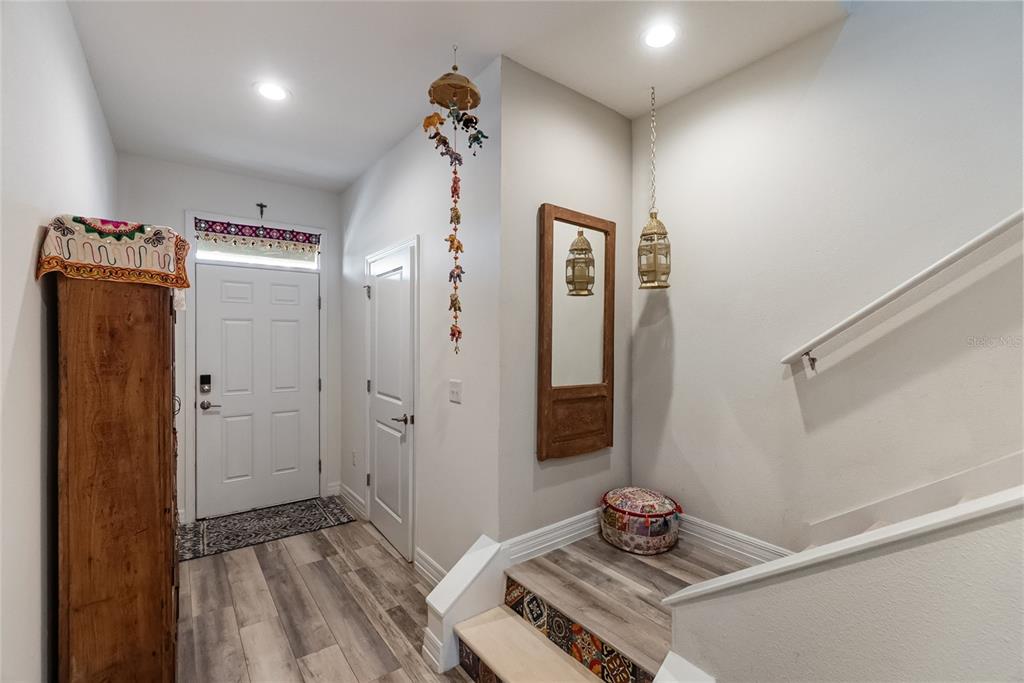 8990 Indigo Trail Loop Riverview, FL 33578 - Photo 17 of 43 a bedroom with a bed and a window