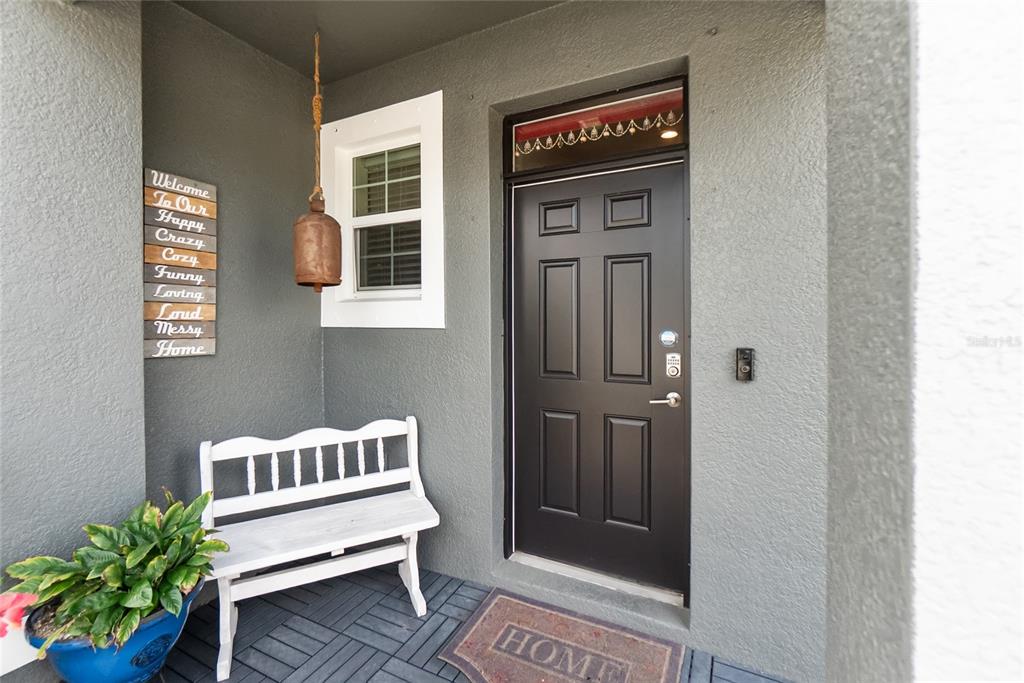8990 Indigo Trail Loop Riverview, FL 33578 - Photo 3 of 43 a view of front door of house