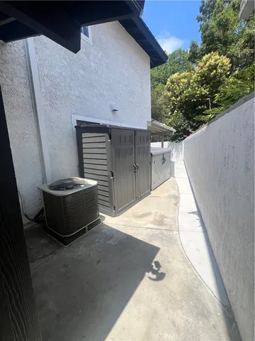 a kitchen with a sink cabinets and a refrigerator
