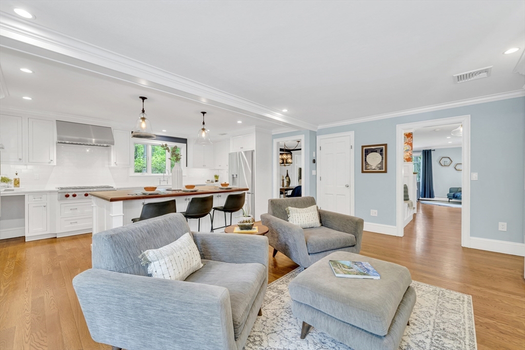 119 Pleasant Valley Road Amesbury, MA 01913 - Photo 5 of 42 a living room with furniture and wooden floor
