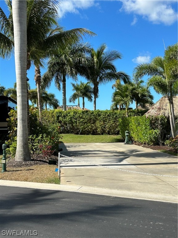 13581 Snapper Lane Naples, FL 34114 - Photo 15 of 34 a view of a house with a street