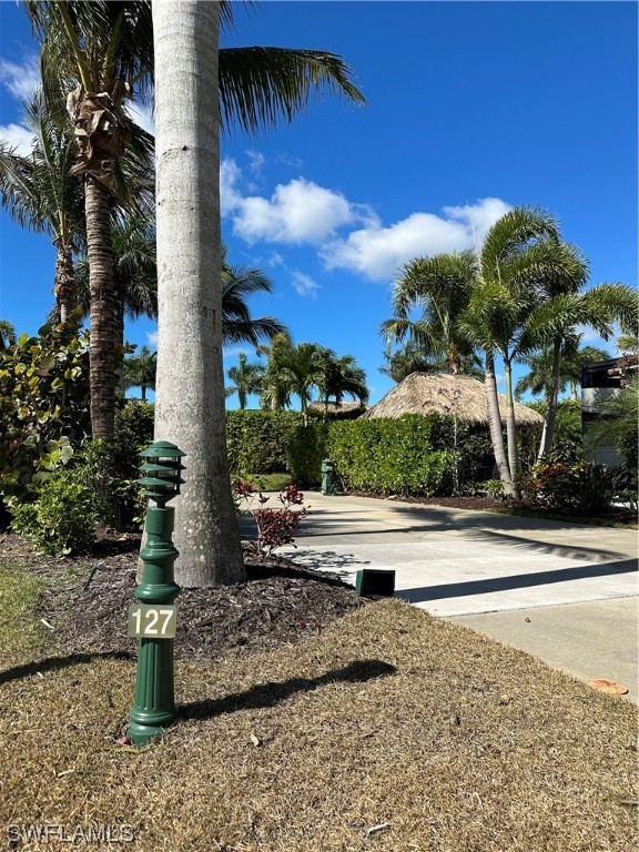 13581 Snapper Lane Naples, FL 34114 - Photo 3 of 34 a view of a yard in front of the house