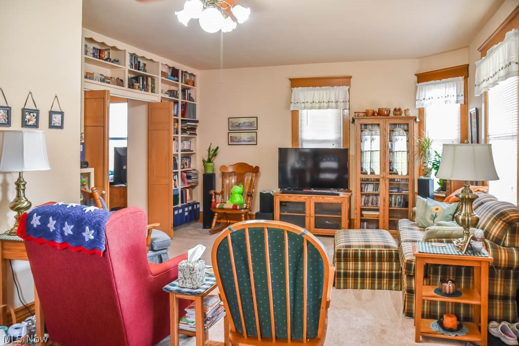 859 Amherst Road Northeast Massillon, OH 44646 - Photo 3 of 17 Spacious living room with lovely built-in shelving.