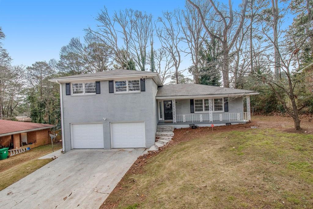 4381 Langdon Drive Decatur, GA 30035 - Photo 1 of 1 NEW custom paint, Engineered Hdwd Flrs, New Kitchen features granite, stained cabinets with soft close doors and drawers!