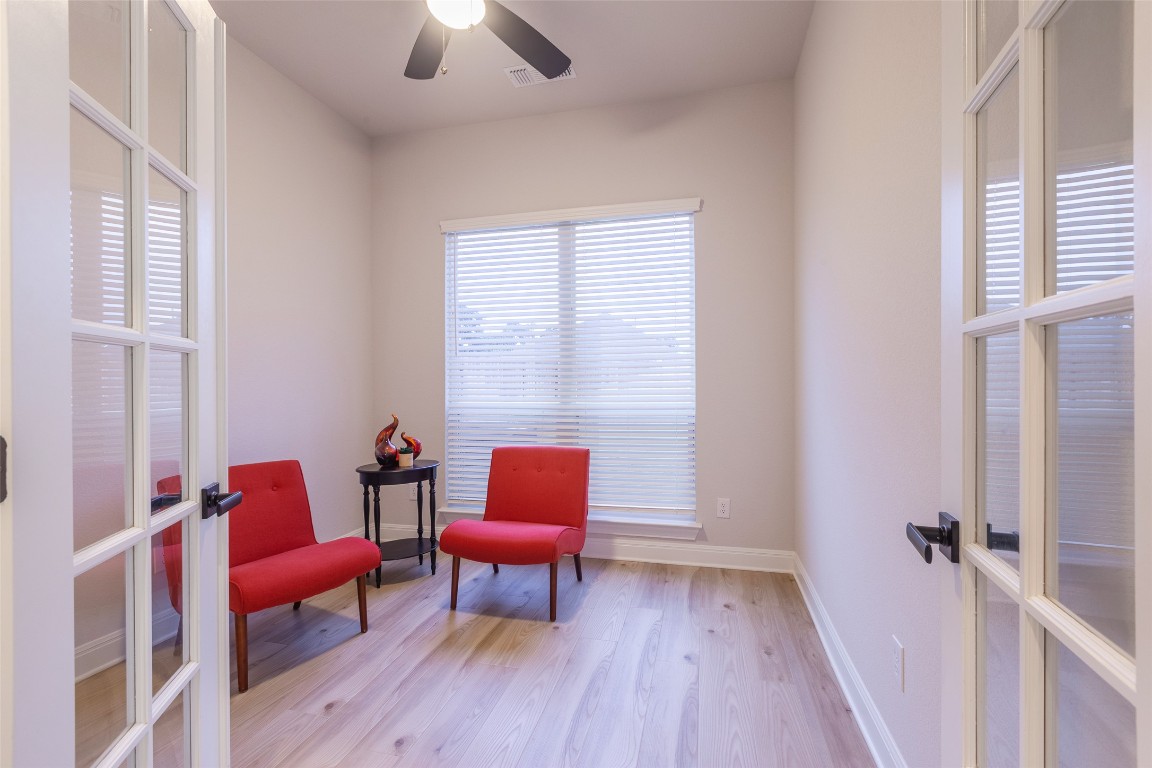 103 Periwinkle Lane Bastrop, TX 78602 - Photo 11 of 35 a living room with furniture a rug and a window