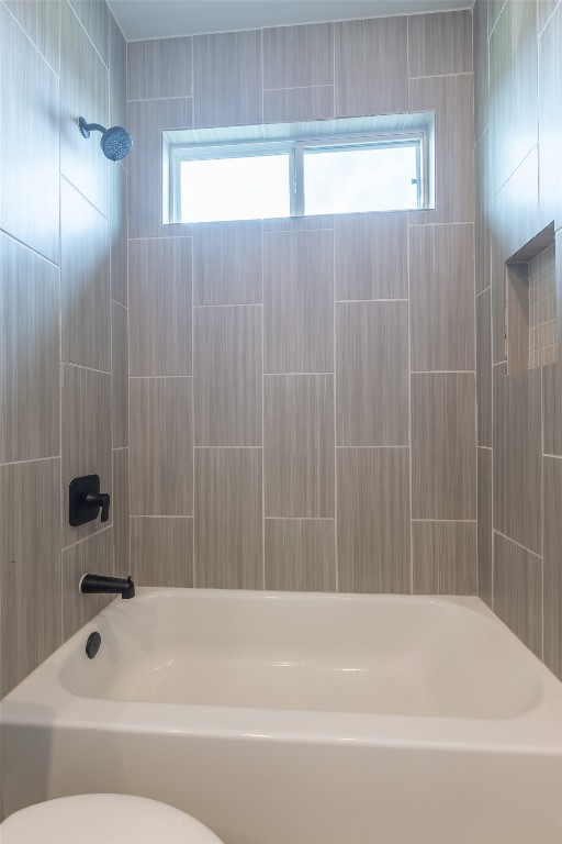 103 Periwinkle Lane Bastrop, TX 78602 - Photo 25 of 35 a bathroom with a bathtub and shower