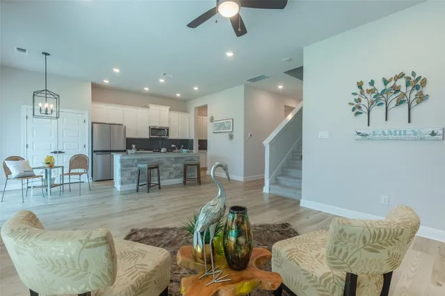 a kitchen with a sink cabinets and window