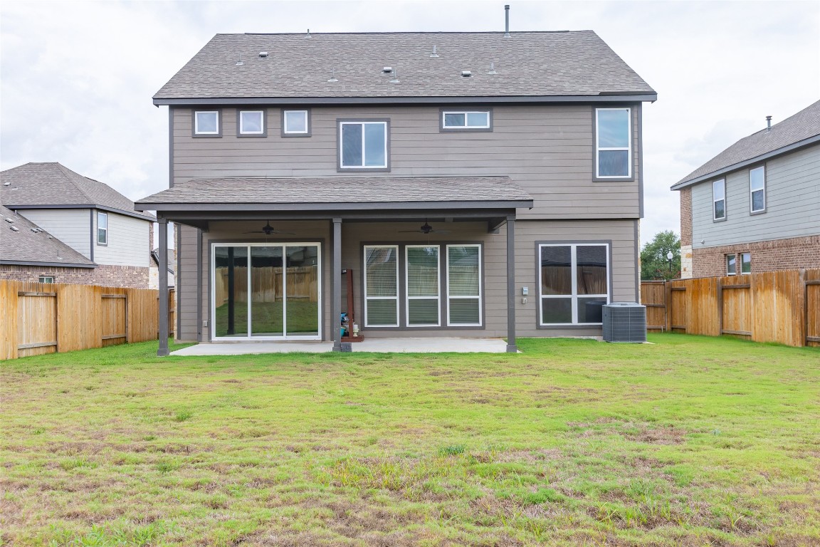 103 Periwinkle Lane Bastrop, TX 78602 - Photo 32 of 35 a view of a house with yard and porch