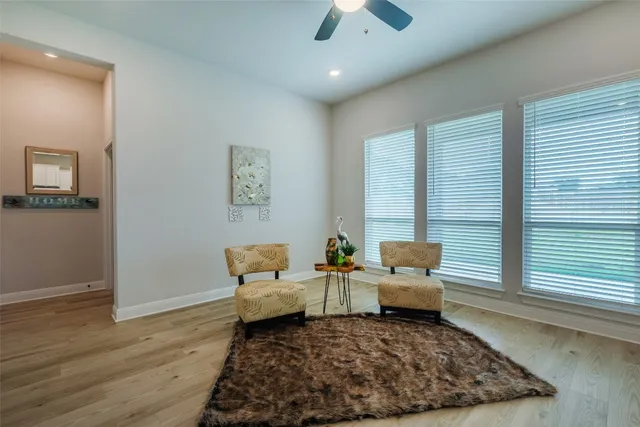 a living room with furniture and a rug