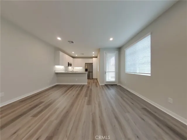 a view of kitchen and windows