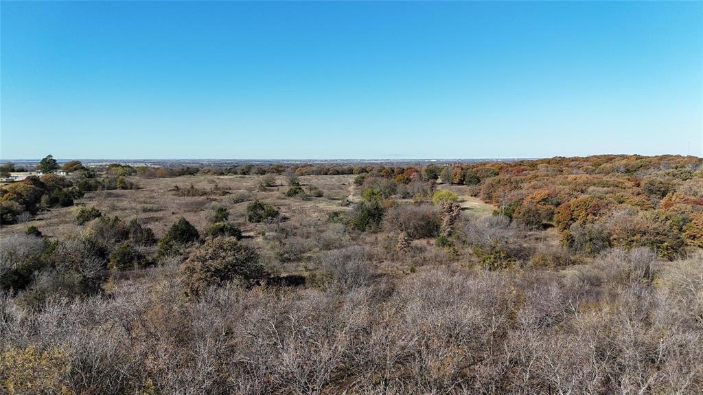 Tbd Tbd Cr-2117 Gainesville, TX 76240 - Photo 26 of 35 an aerial view of house with yard and mountain view in back