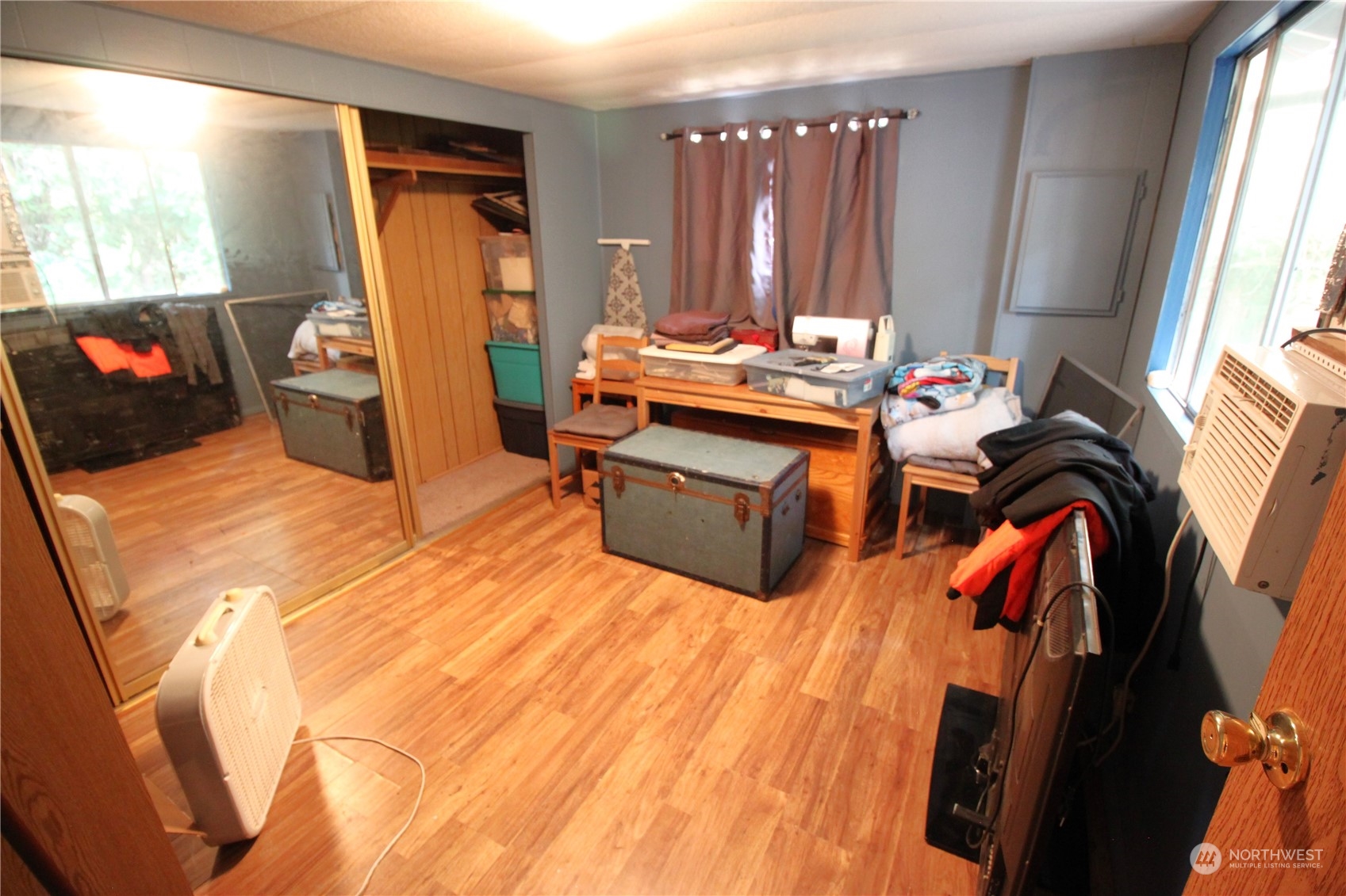 11410 Riverside Drive Southeast Olympia, WA 98513 - Photo 12 of 19 a bedroom with a bed and a window