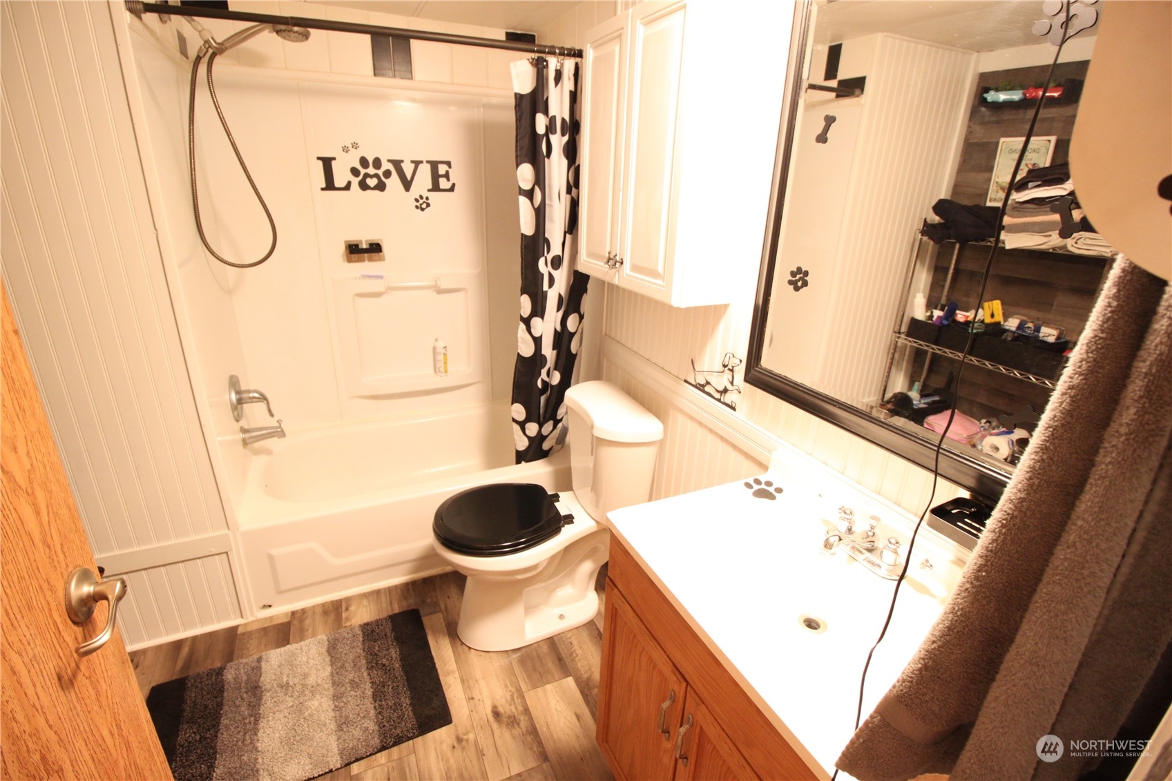 11410 Riverside Drive Southeast Olympia, WA 98513 - Photo 13 of 19 a bathroom with a sink and a mirror