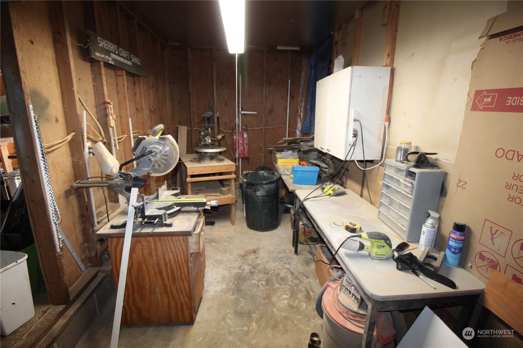 11410 Riverside Drive Southeast Olympia, WA 98513 - Photo 18 of 19 a bedroom with furniture a rug and white walls