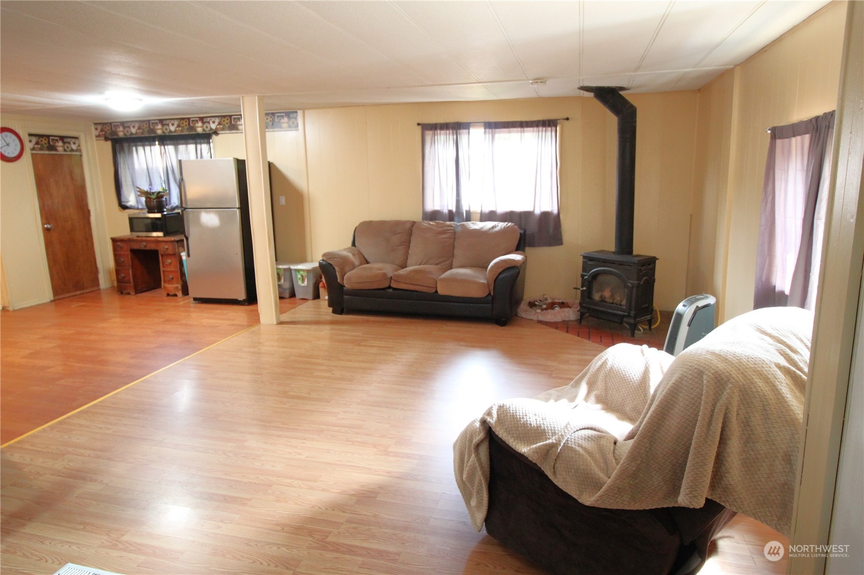 11410 Riverside Drive Southeast Olympia, WA 98513 - Photo 8 of 19 a living room with furniture window and a couch