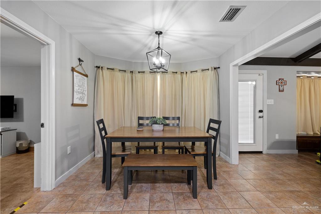 2212 North Bryan Rd Mission Mission, TX 78572 - Photo 13 of 44 a view of a dining room with furniture window and outside view
