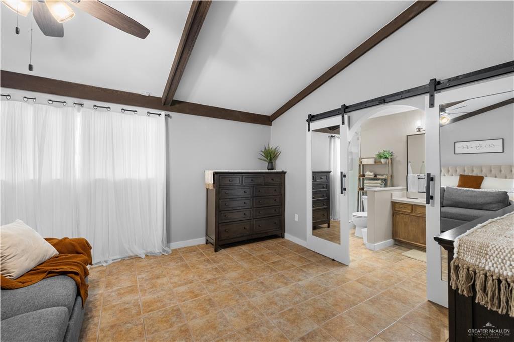 2212 North Bryan Rd Mission Mission, TX 78572 - Photo 16 of 44 a bedroom with furniture and a walk in closet