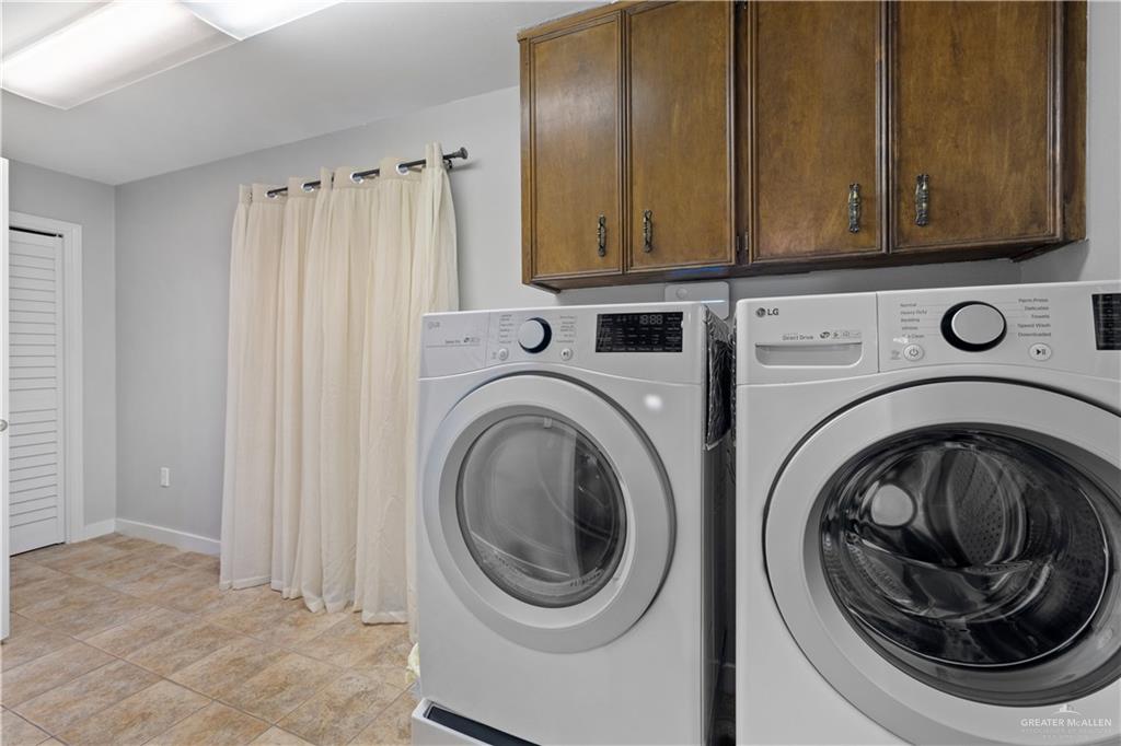 2212 North Bryan Rd Mission Mission, TX 78572 - Photo 27 of 44 a utility room with sink dryer and washer