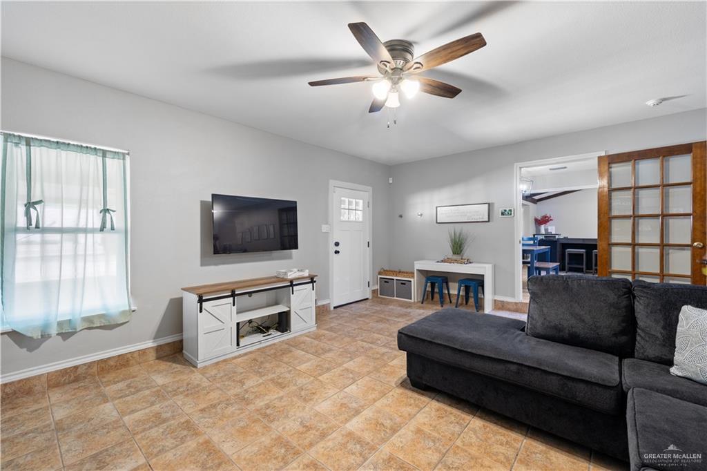 2212 North Bryan Rd Mission Mission, TX 78572 - Photo 30 of 44 a living room with furniture and a flat screen tv