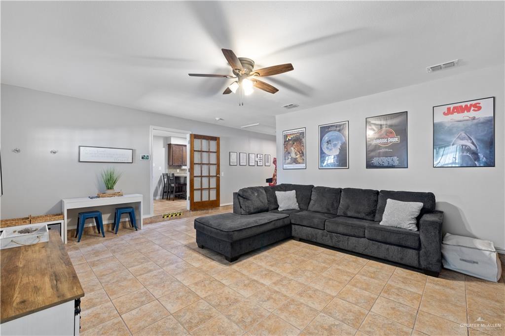 2212 North Bryan Rd Mission Mission, TX 78572 - Photo 31 of 44 a living room with furniture and a dining table
