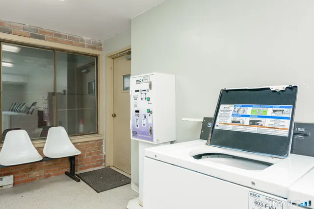 a room with a table and chairs