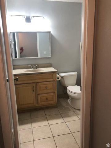 88 West 50 South, Unit B5 Centerville, UT 84014 - Photo 14 of 33 Half bathroom with vanity and light tile patterned floors