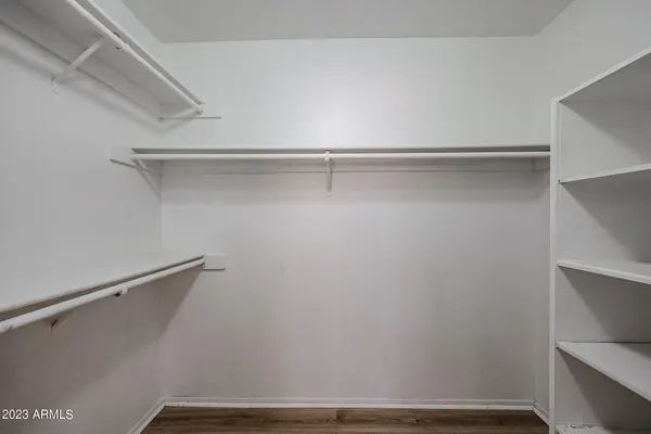 a view of an empty walk in closet