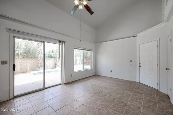 a view of an empty room with a window