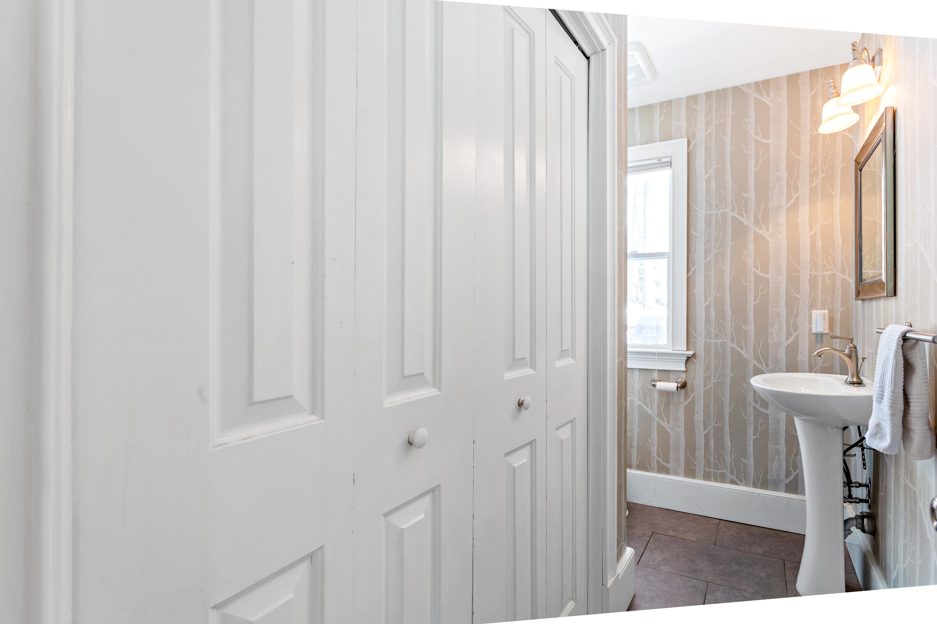 10 Little Brook Road Rowayton, CT 06853 - Photo 11 of 16 a view of a bathroom with a sink