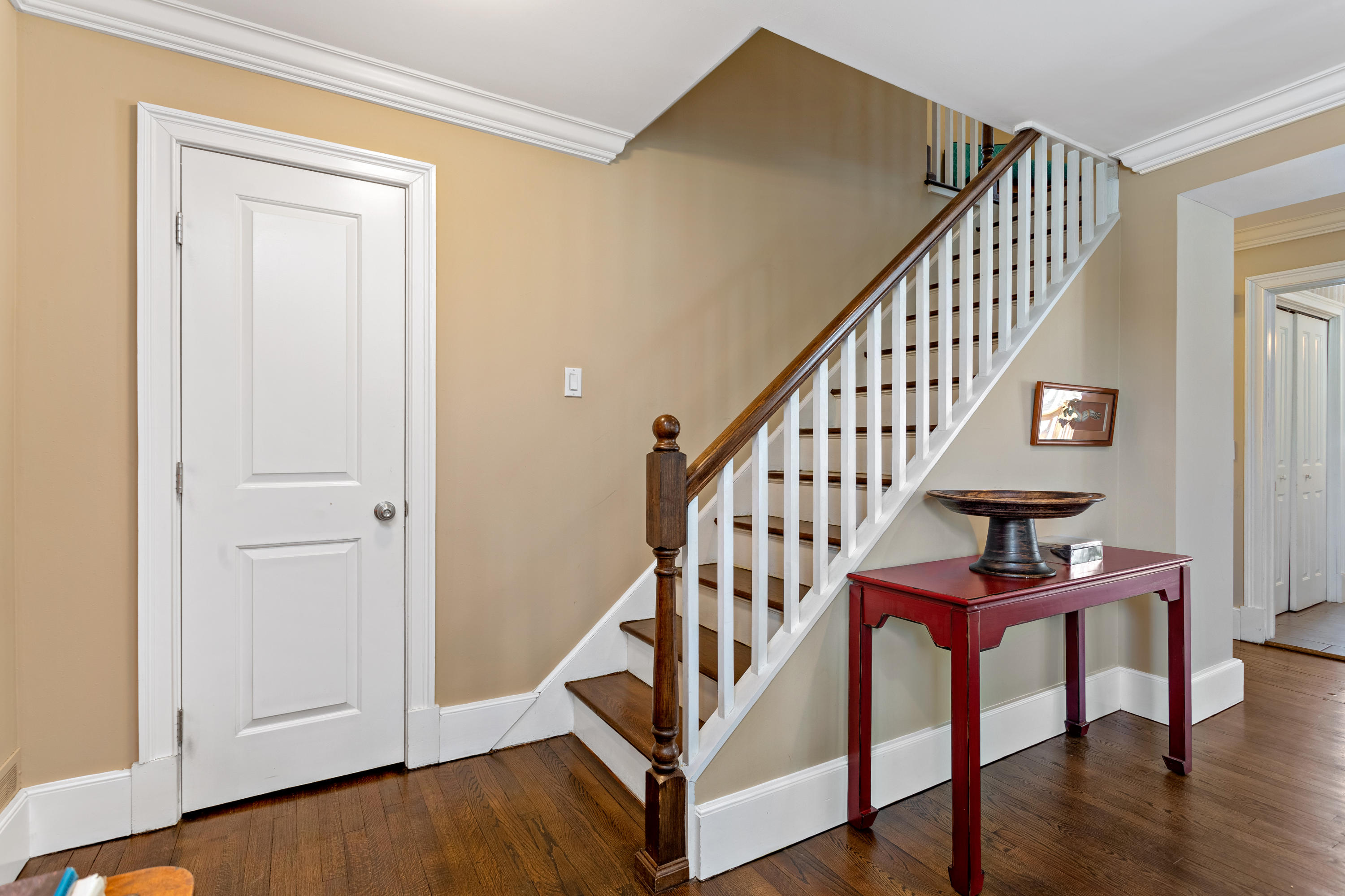 10 Little Brook Road Rowayton, CT 06853 - Photo 12 of 16 a view of entryway with wooden floor and stairs