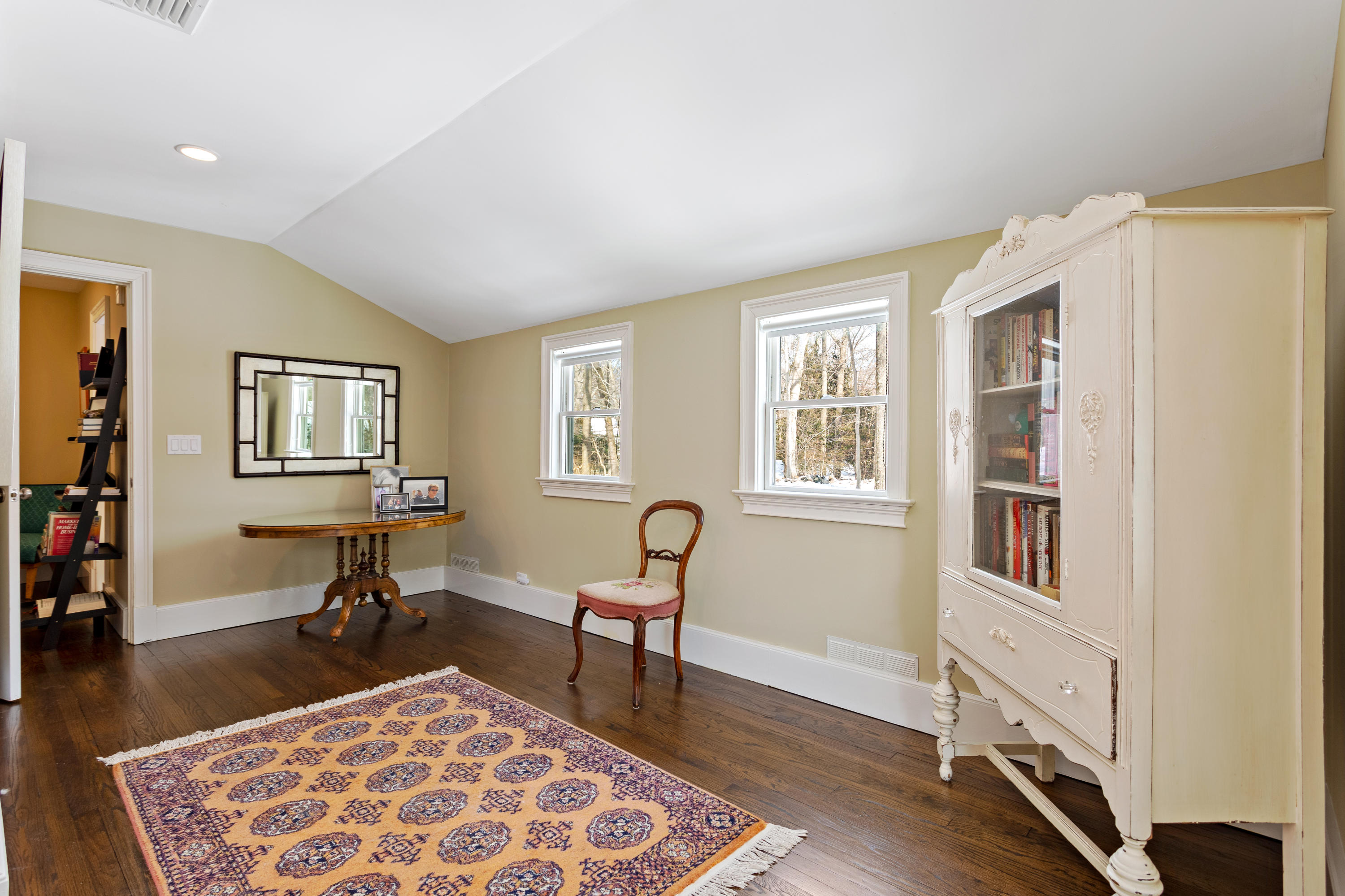 10 Little Brook Road Rowayton, CT 06853 - Photo 14 of 16 a living room with furniture and a window