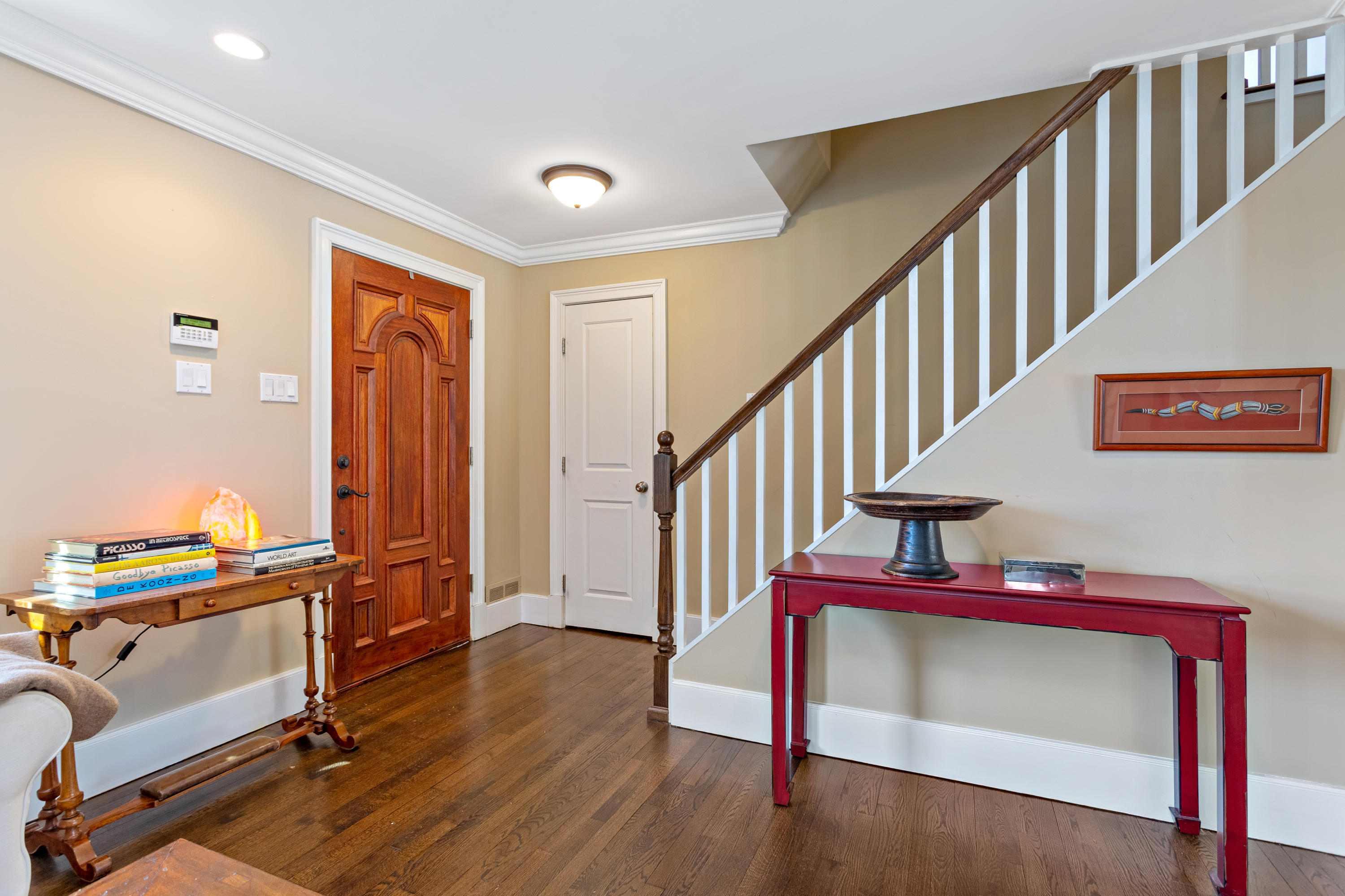 10 Little Brook Road Rowayton, CT 06853 - Photo 3 of 16 a view of entryway with wooden floor and stairs