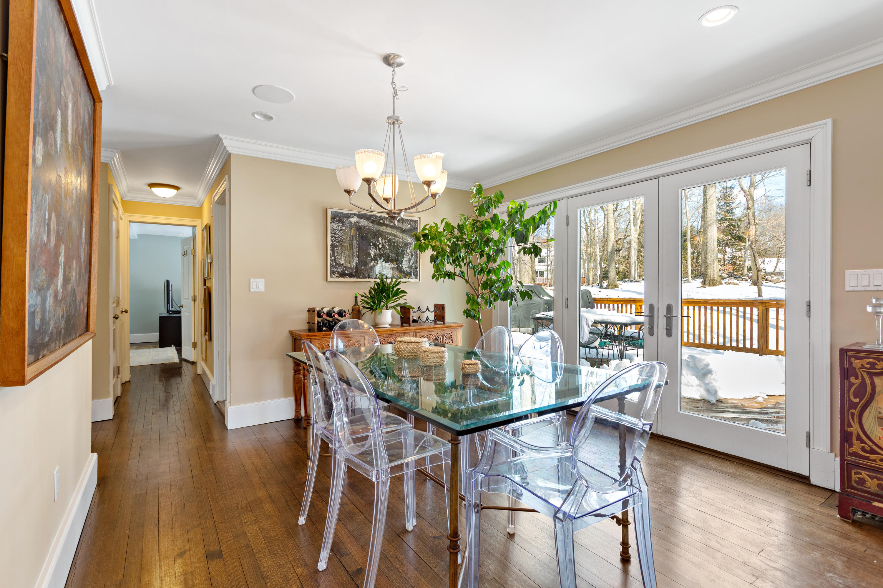 10 Little Brook Road Rowayton, CT 06853 - Photo 7 of 16 a view of a dining room with furniture window and wooden floor
