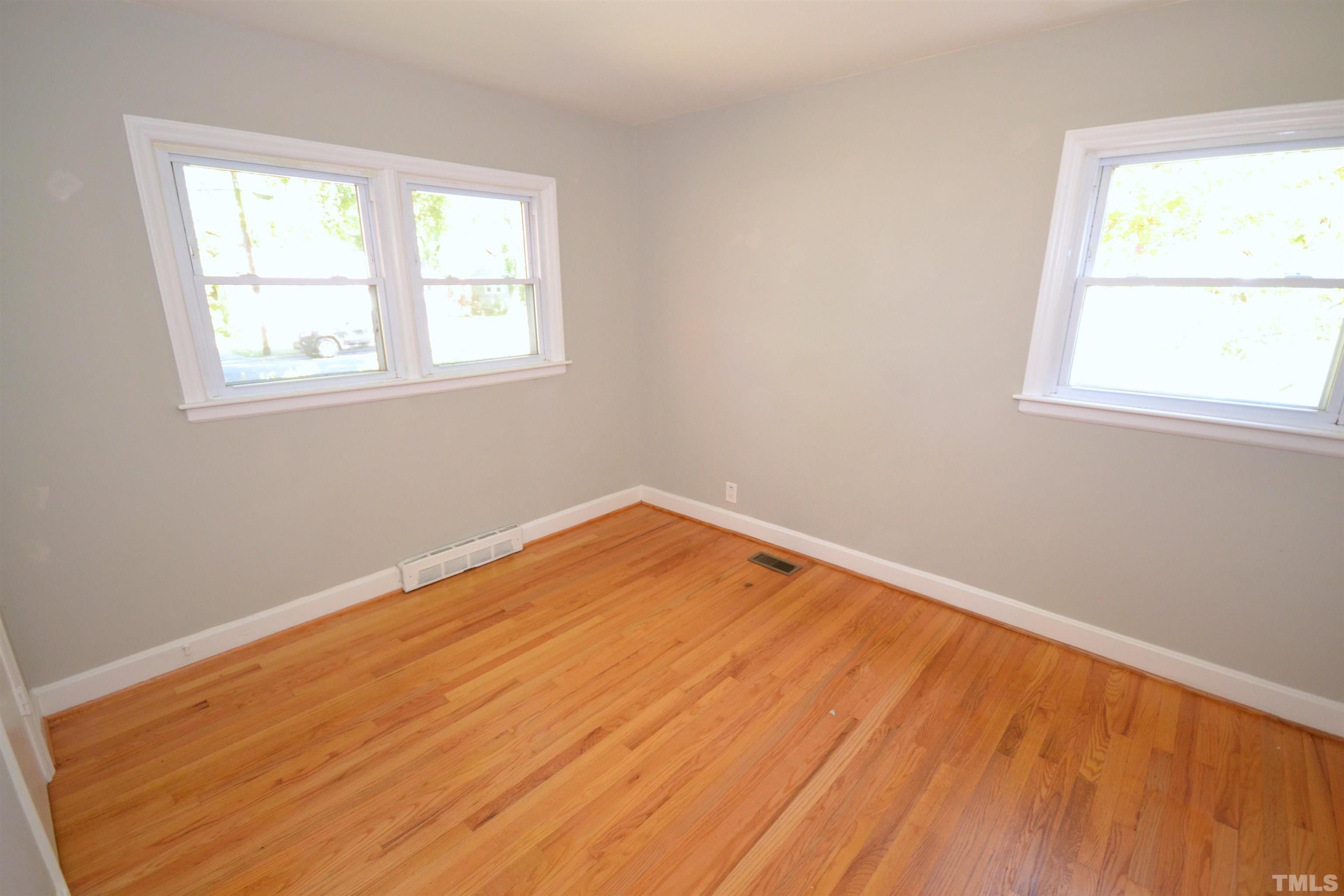 1713 Forest Road Durham, NC 27705 - Photo 19 of 35 an empty room with a window
